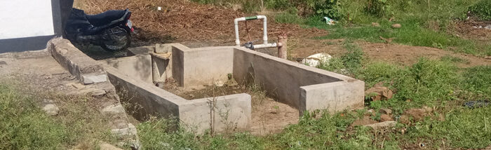 Dry borewell refurbished with a recharging structure