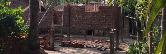Building indigenously designed flood resilient houses in Assam